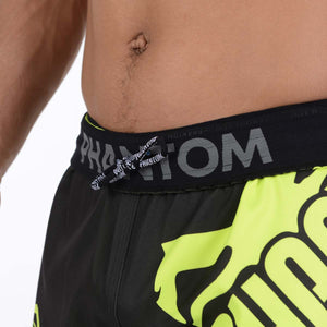 Fight Shorts Revolution Black Neon von Phantom Athletics, ideal für Kampfsportarten wie Kickboxen und MMA. Die Kombination aus strapazierfähigen Materialien und auffälligem Neon-Design macht sie zu einem echten Highlight.