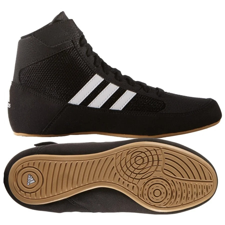 Chaussures de lutte Adidas pour enfants. L'Adidas Havoc est considérée comme l'une des meilleures chaussures de lutte pour les jeunes lutteurs. Avec une semelle adhérente et une fermeture Velcro à la cheville qui maintient bien les lacets de la chaussure.